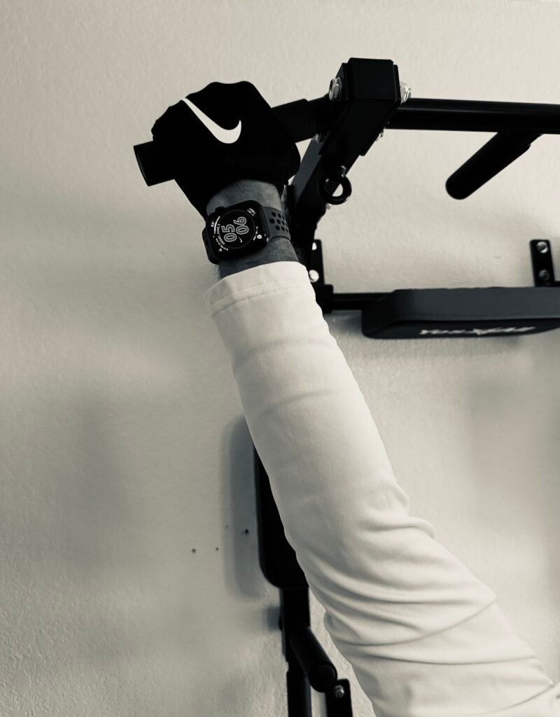 Proper grip position for dead hang benefits including grip strength and spinal decompression